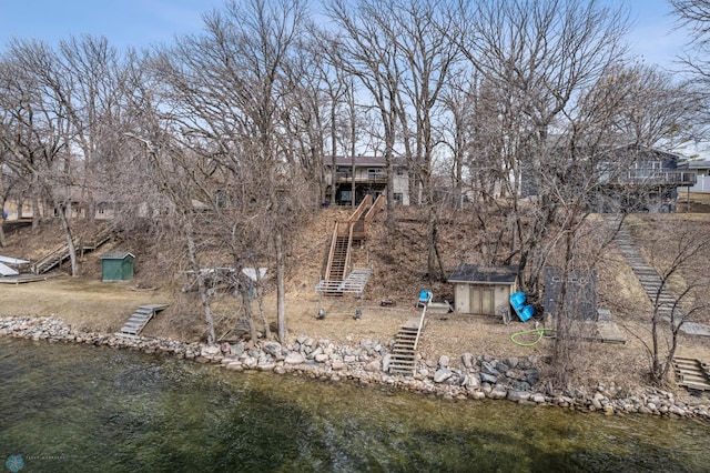 15924 Blackhawk Rd, Lake Park, MN 56554 - back of property with stairway and a water view