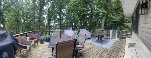 15924 Blackhawk Rd, Lake Park, MN 56554 - wooden terrace with outdoor dining area