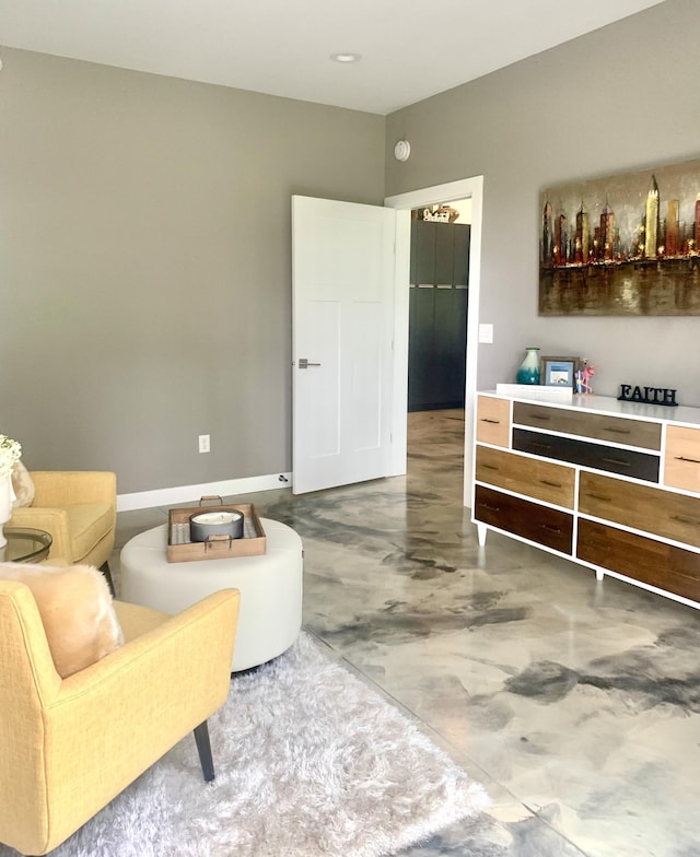 4405 17th Ave NW, Sauk Rapids, MN 56379 - sitting room with finished concrete floors and baseboards