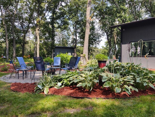 4405 17th Ave NW, Sauk Rapids, MN 56379 - view of yard featuring a patio