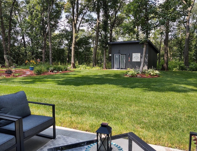4405 17th Ave NW, Sauk Rapids, MN 56379 - view of yard with a patio area and an outbuilding