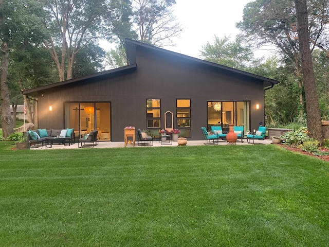 4405 17th Ave NW, Sauk Rapids, MN 56379 - rear view of property featuring a yard, an outdoor hangout area, and a patio area