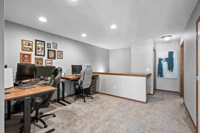 carpeted office with baseboards and recessed lighting