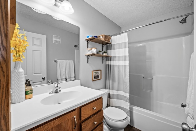 bathroom featuring shower / tub combo with curtain, a textured ceiling, toilet, and vanity