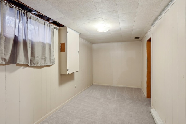 11749 Crooked Lake Blvd NW, Coon Rapids, MN 55433 - basement featuring baseboards and light carpet