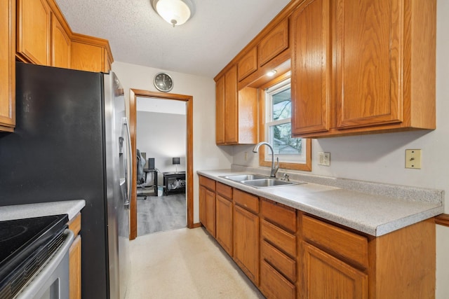 11749 Crooked Lake Blvd NW, Coon Rapids, MN 55433 - kitchen with a sink, appliances with stainless steel finishes, brown cabinetry, and light countertops
