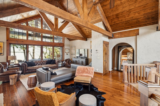 8434 Big Whitefish Narrows, Pine River, MN 56474 - living room with high vaulted ceiling, arched walkways, wood ceiling, and hardwood / wood-style floors