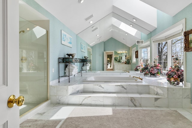full bath with visible vents, a bath, lofted ceiling with skylight, and a stall shower