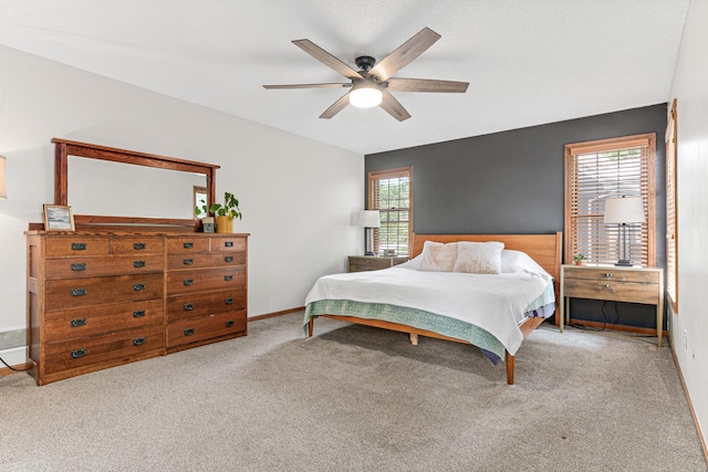 12534 Dover Dr, Apple Valley, MN 55124 - carpeted bedroom with a ceiling fan and baseboards
