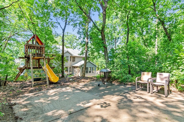 12534 Dover Dr, Apple Valley, MN 55124 - view of patio featuring a playground