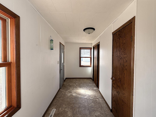 hallway featuring visible vents