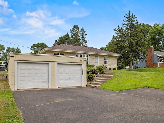 1883 County Road C E, Maplewood, MN 55109 - view of front of house featuring a front lawn and stairway
