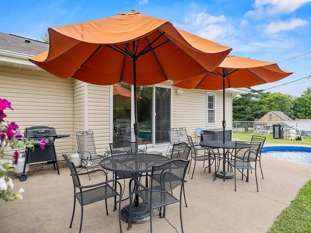 1883 County Road C E, Maplewood, MN 55109 - view of patio / terrace with outdoor dining area and area for grilling