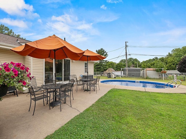 1883 County Road C E, Maplewood, MN 55109 - view of swimming pool with a patio