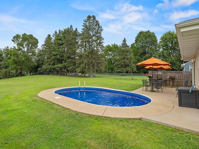 1883 County Road C E, Maplewood, MN 55109 - view of pool with a patio area, a fenced backyard, and view of wooded area