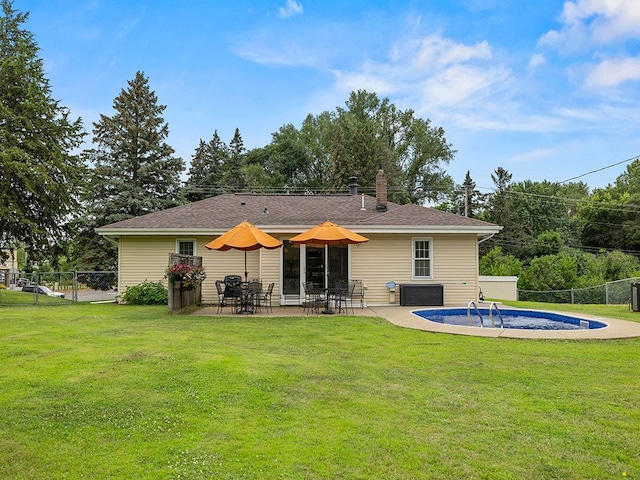 1883 County Road C E, Maplewood, MN 55109 - back of property featuring a patio and a chimney
