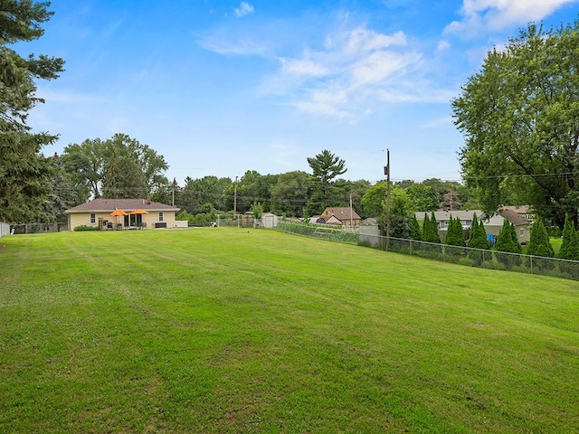 1883 County Road C E, Maplewood, MN 55109 - view of yard featuring view of wooded area