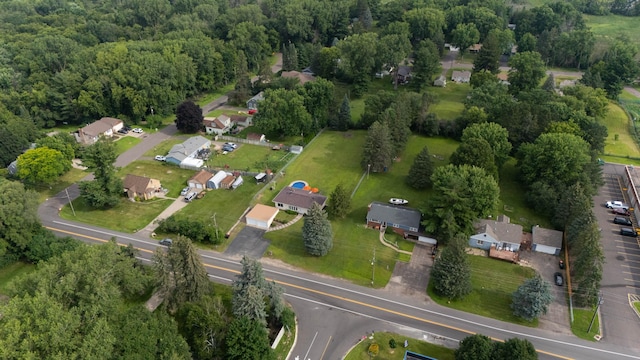 1883 County Road C E, Maplewood, MN 55109 - aerial overview of property's location featuring a forest and nearby suburban area