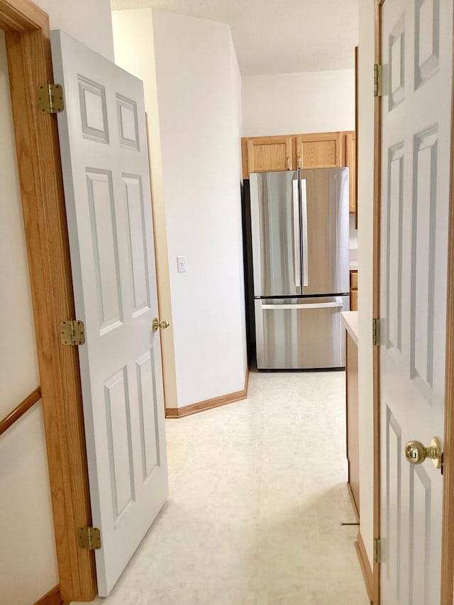 16873 79th Ave N, Maple Grove, MN 55311 - kitchen featuring freestanding refrigerator, baseboards, light countertops, and light flooring