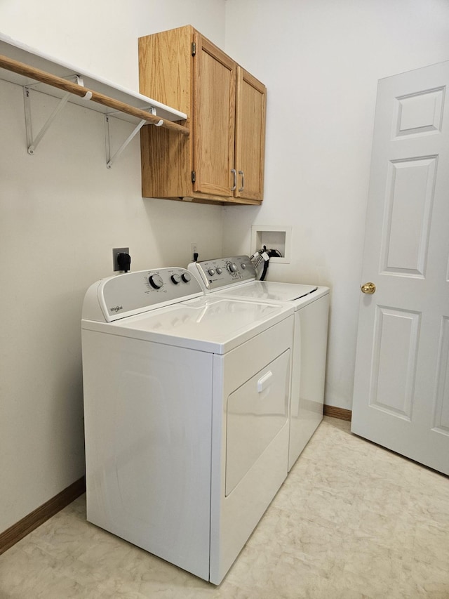16873 79th Ave N, Maple Grove, MN 55311 - laundry area with cabinet space, washing machine and dryer, and baseboards