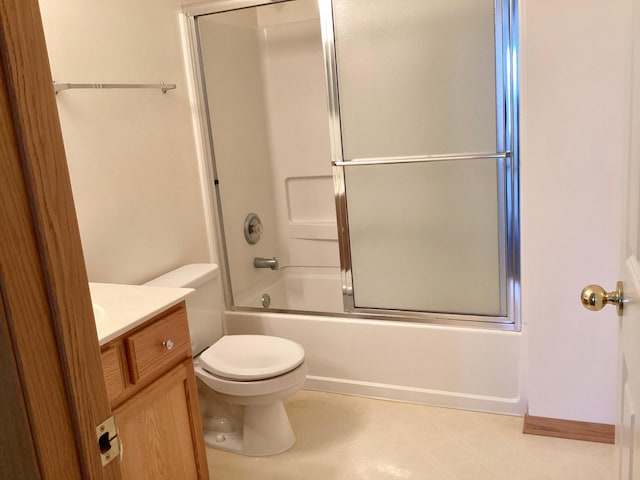 16873 79th Ave N, Maple Grove, MN 55311 - bathroom with toilet, vanity, and shower / bath combination with glass door