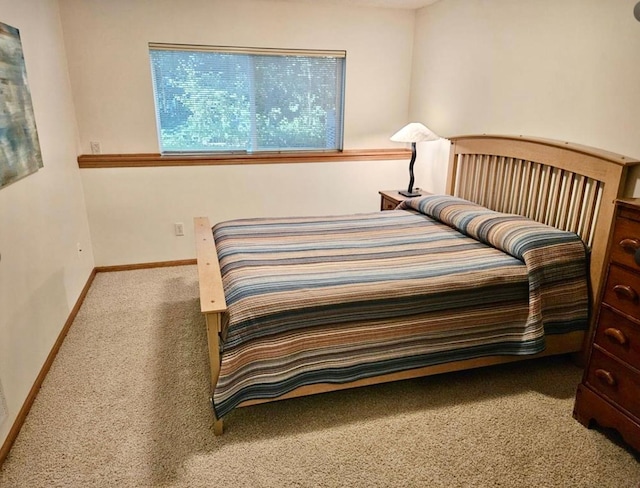 16873 79th Ave N, Maple Grove, MN 55311 - carpeted bedroom featuring baseboards