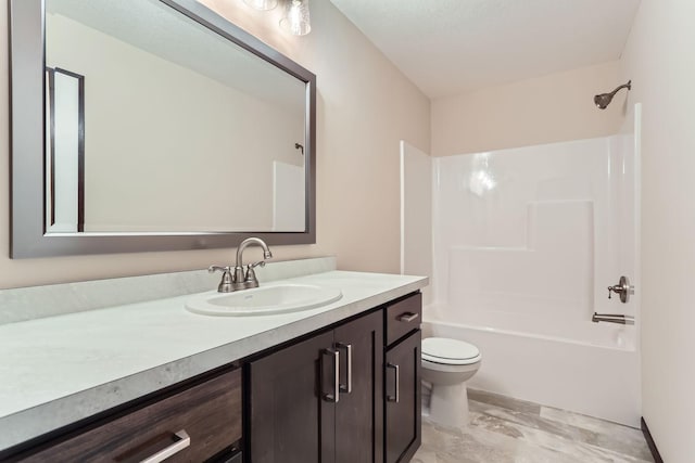 bathroom with toilet, vanity, and bathing tub / shower combination