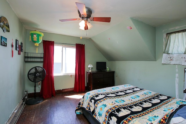 bedroom featuring a ceiling fan, hardwood / wood-style floors, and lofted ceiling