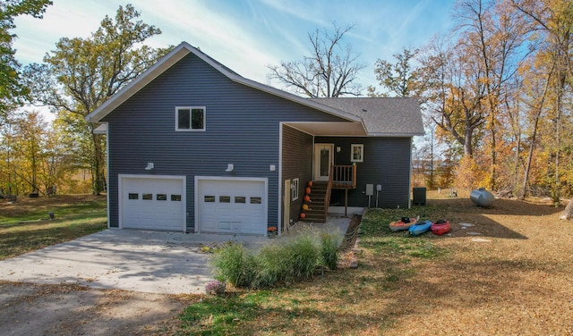 36861 477th Ave, Otto Twp, MN 56567 - view of front facade featuring concrete driveway and a garage