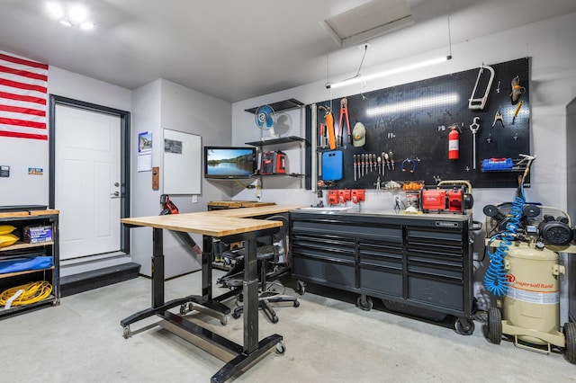 garage featuring a workshop area