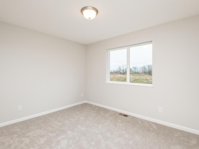 539 Winkler Trl N, Cologne, MN 55322 - empty room featuring visible vents, baseboards, and carpet flooring