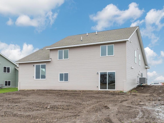539 Winkler Trl N, Cologne, MN 55322 - back of property with a shingled roof and central AC unit