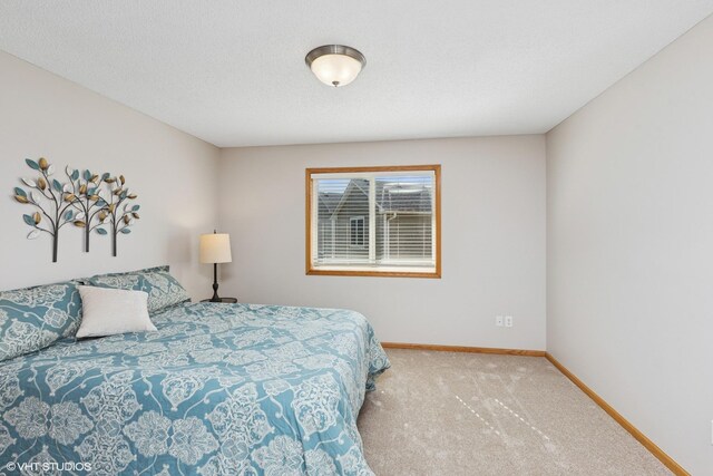 128 Oakmont Ln, Red Wing, MN 55066 - carpeted bedroom with baseboards