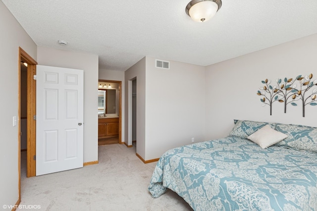 128 Oakmont Ln, Red Wing, MN 55066 - bedroom featuring light colored carpet, baseboards, and a textured ceiling
