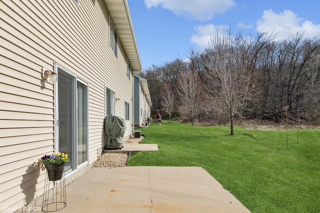 128 Oakmont Ln, Red Wing, MN 55066 - view of green lawn featuring a patio