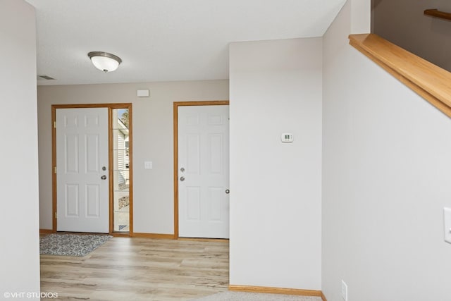 128 Oakmont Ln, Red Wing, MN 55066 - entryway featuring light wood-type flooring and baseboards