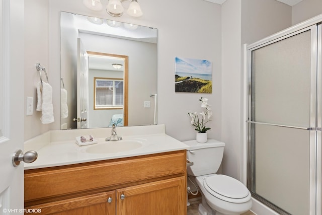 128 Oakmont Ln, Red Wing, MN 55066 - ensuite bathroom with a stall shower, vanity, and toilet