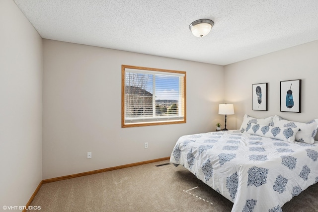 128 Oakmont Ln, Red Wing, MN 55066 - bedroom with carpet, baseboards, and a textured ceiling