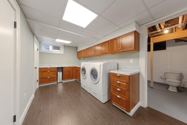 525 Main St, Owatonna, MN 55060 - washroom with washer and clothes dryer, laundry area, baseboards, and dark wood finished floors