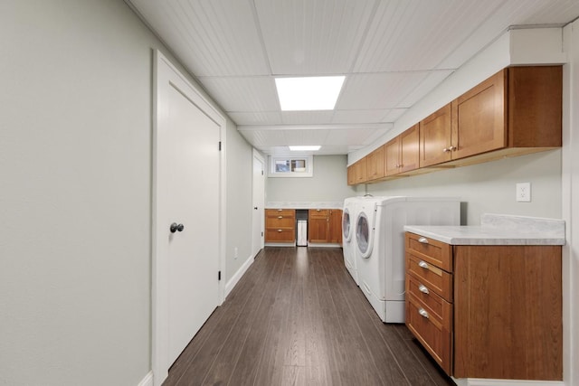 525 Main St, Owatonna, MN 55060 - clothes washing area with cabinet space, washer and dryer, and dark wood finished floors