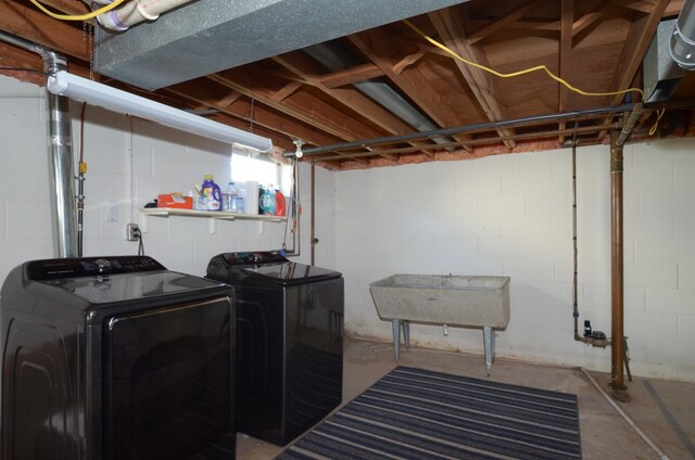 laundry room featuring washing machine and dryer