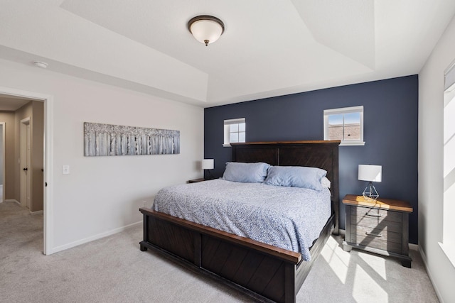 6921 Huckleberry Dr, Minnetrista, MN 55331 - carpeted bedroom featuring a raised ceiling