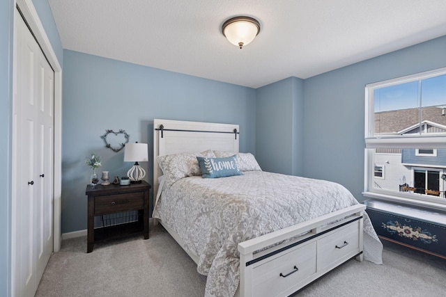 6921 Huckleberry Dr, Minnetrista, MN 55331 - bedroom with light colored carpet and a closet