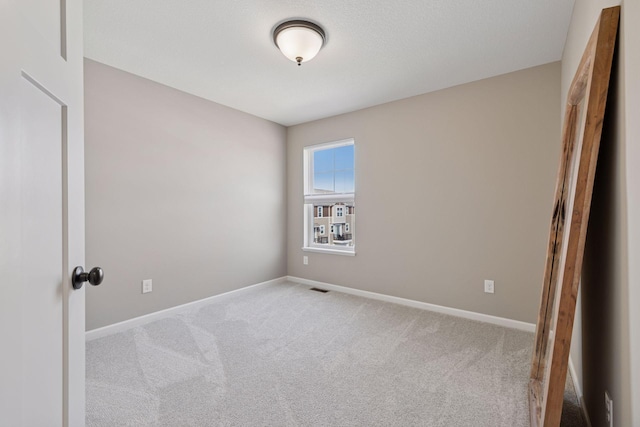 6921 Huckleberry Dr, Minnetrista, MN 55331 - empty room featuring carpet floors and baseboards