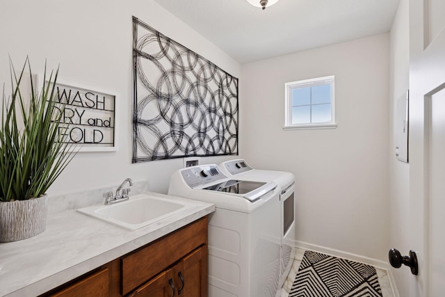 6921 Huckleberry Dr, Minnetrista, MN 55331 - laundry area with washing machine and clothes dryer and baseboards