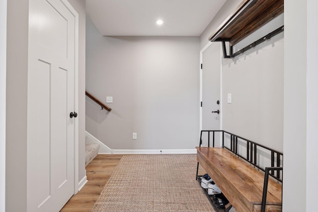 6921 Huckleberry Dr, Minnetrista, MN 55331 - hall with recessed lighting, light wood-type flooring, and stairway