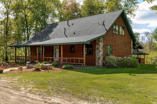 33507 Old 371, Pequot Lakes, MN 56472 - view of front of home featuring covered porch, a shingled roof, a front lawn, and faux log siding