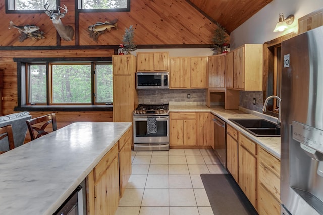 33507 Old 371, Pequot Lakes, MN 56472 - kitchen with appliances with stainless steel finishes, high vaulted ceiling, light brown cabinets, light tile patterned flooring, and wooden ceiling
