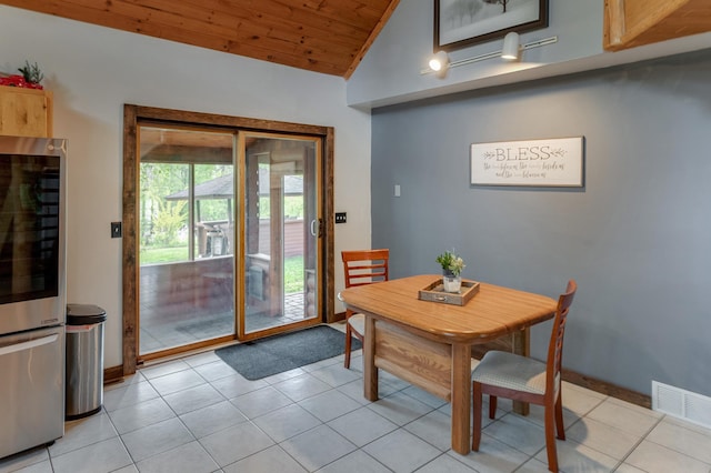 33507 Old 371, Pequot Lakes, MN 56472 - dining space with lofted ceiling, wooden ceiling, and light tile patterned flooring