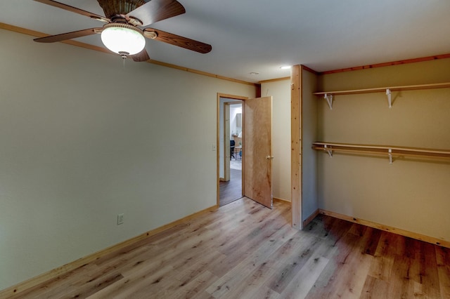 33507 Old 371, Pequot Lakes, MN 56472 - unfurnished bedroom with light wood finished floors, a closet, and ceiling fan